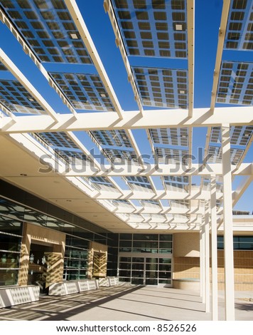 Modern building utilizing solar energy cells incoropated into the architecture