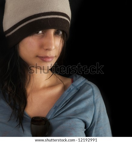 Beautiful young woman wearing beanie hat
