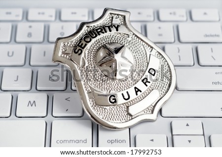 Security badge on computer keyboard