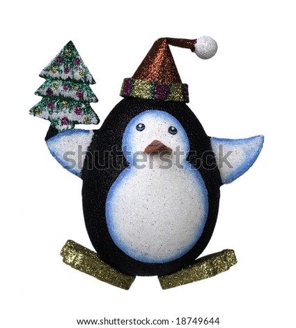 Fun cute Christmas Penguin wearing red hat and holding Christmas tree