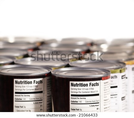 Canned food lined up on shelf with nutrition fact label