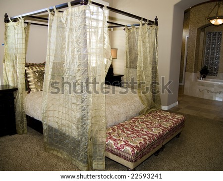Asian inspired bedroom interior design featuring luxury four poster bed