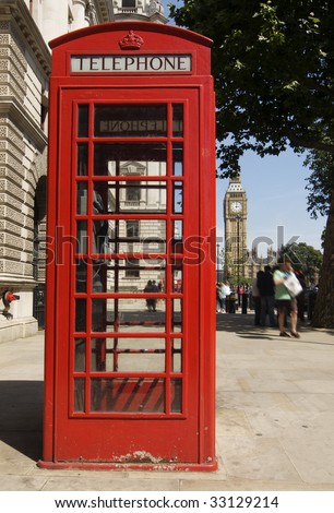 Red telephone box in Westminster London with Big Ben in background
