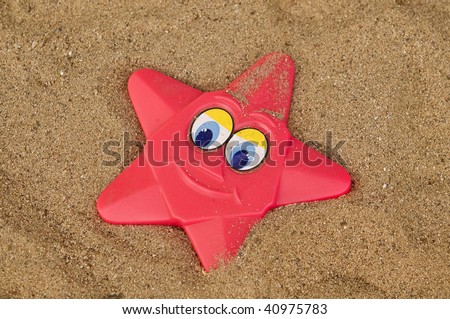 Colorful beach star shape smiling toy