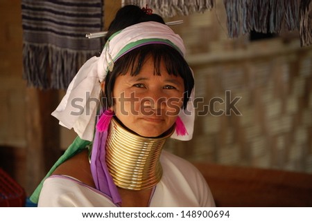 MAE HONG SON, THAILAND - JUN 2010: Portrait of a Karen long neck hill tribe girl in Baan Mai Nai Soi, Thiland circa June 2010.