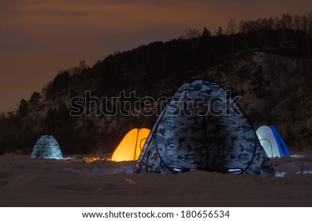 Winter fishing in the tent at night