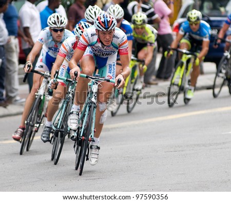 KUALA LUMPUR, MALAYSIA-FEB 1: An unidentified group of cyclists in action  at the final stage of le Tour de Langkawi on February 1, 2011 in Kuala Lumpur.