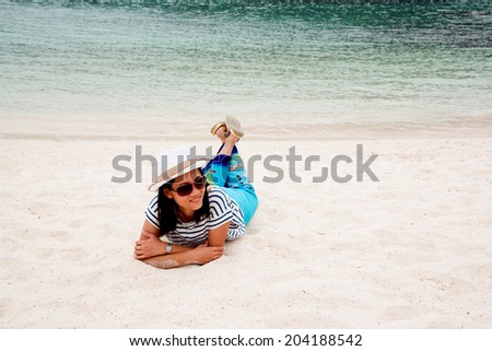 A woman feel good on beach, southern, Thailand.