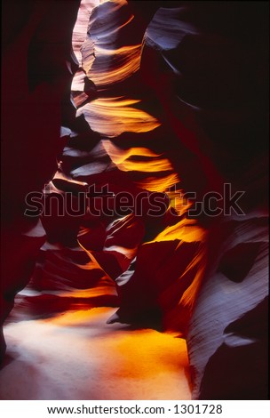 A slot canyon, sliced through the mesa by rushing water, located in Colorado Plateau.