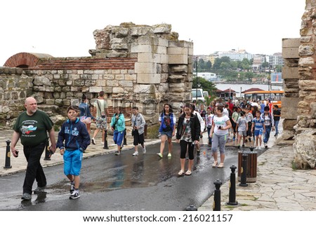 NESSEBAR, BULGARIA - JUNE 18: People visit Old Town on June 18, 2014 in Nessebar, Bulgaria. Nessebar in 1956 was declared as museum city, archaeological and architectural reservation by UNESCO.