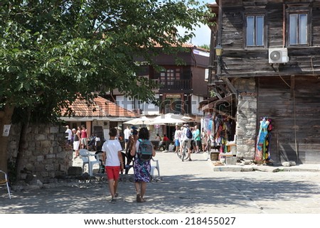 NESEBAR, BULGARIA - AUGUST 29: People visit Old Town on August 29, 2014 in Nesebar, Bulgaria. Nesebar in 1956 was declared as museum city, archaeological and architectural reservation by UNESCO.
