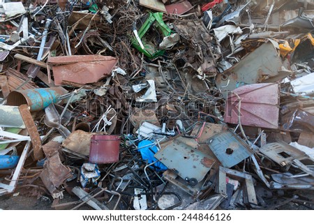 stack of scrap metal at recycling center. abstract background