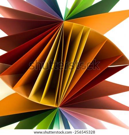 macro image of colored sheets of paper arranged in helix fan shape