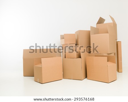 stacked up moving boxes in empty house. copy space available