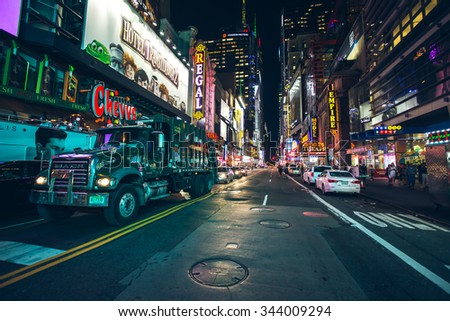New York City - September 15: Manhattan night view traffic w 42nd st garbage truck on september 2015.