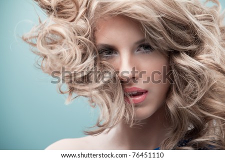 portrait curly blonde wind hair