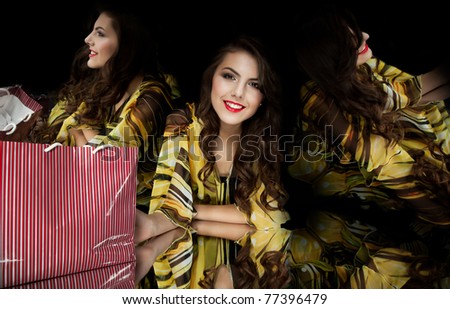 brunette woman shopping bag kaleidoscope mirrors smiling