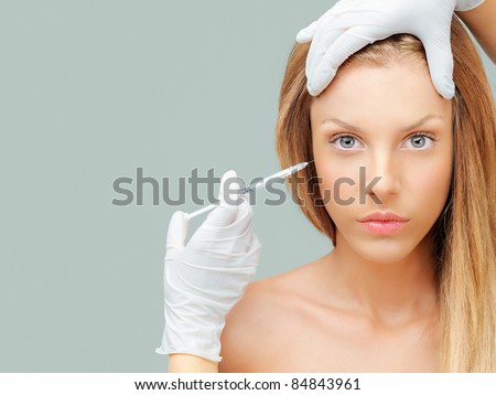 beautiful young woman injection eye wrinkles