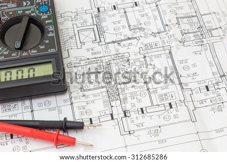 Still Life Of Electrical Components Arranged On Plans. Centered
