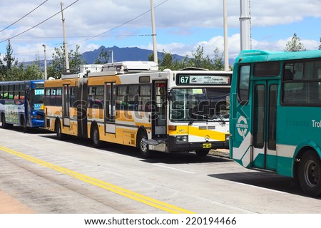 QUITO, ECUADOR - AUGUST 8, 2014: Trolleybus of the local public transportation system standing outside the Quitumbe Terminal Terrestre (long-distance bus terminal) on August 8, 2014 in Quito, Ecuador
