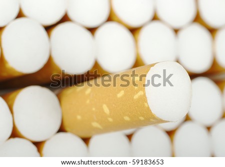 Cigarette pulled out of an open Cigarette packet (Selective Focus)