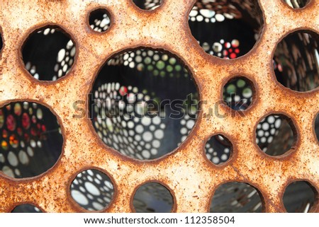 old metal texture with big round holes