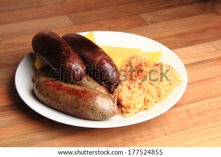 white and black pudding with potatoes and sauerkraut (czech traditional food)