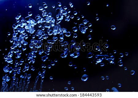 blue water drops in the air