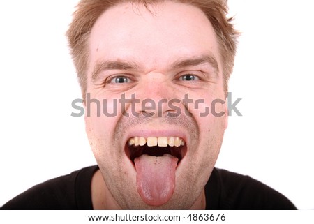 stock photo : Crazy face of ugly man lolling out his tongue