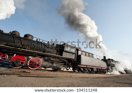 An Old Fashioned Steam Engine and Train.