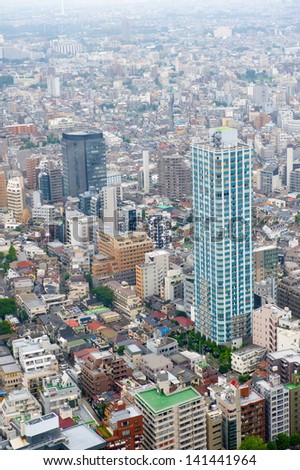 TOKYO - JUNE 24: City architecture view in Roppongi district on June 24, 2012 in Tokyo, Japan. Tokyo is the capital city of Japan and the most populous metropolitan area in the world.
