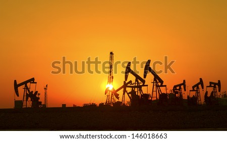 Oil Pump on orange sunset Oil Pump on orange sunset