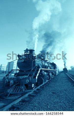 An Old Fashioned Steam Engine and Train.