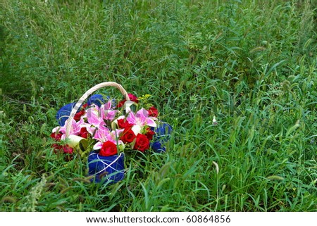 Basket of flowers on the lawn