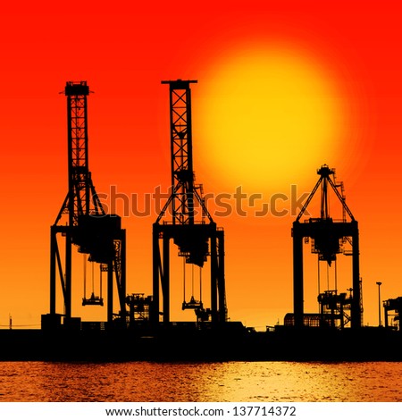 silhouette industrial shipping port with sun