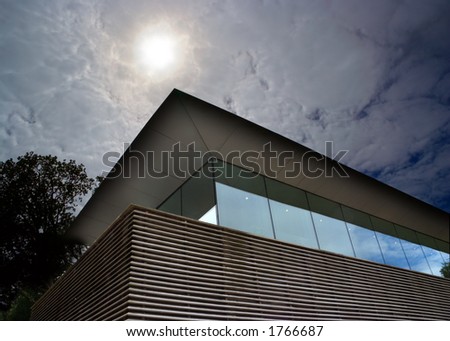 Example of modern architecture below thin cloud