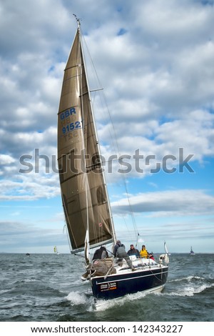 ISLE OF WIGHT - JUNE 1st: The annual JP Morgan Asset Management, Round the Island yacht race took place off the south coast of England, attracting some 1400 entrants on 1st June 2013.