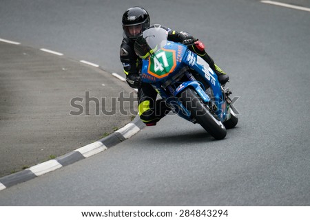 ISLE OF MAN, UK - MAY 30: A rider undertakes their first official practice laps of the annual TT (Tourist Trophy) race on 30 May 2015 in the Isle of Man (Public Event)