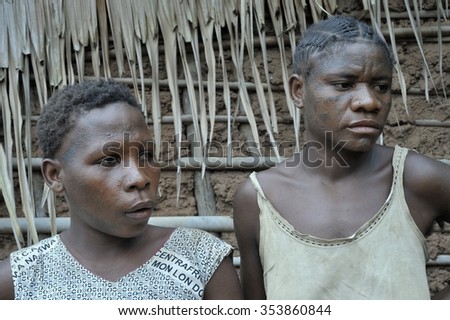 DZANGA-SANHA FOREST RESERVE, CENTRAL AFRICAN REPUBLIC - NOVEMBER 5, 2008: Portrait of a women from a tribe of Baka pygmies. Dzanga-Sangha Forest Reserve, Central African Republic, November 5, 2008