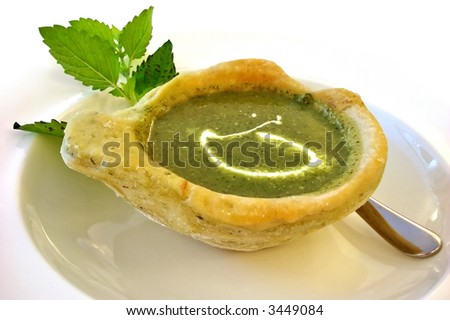 Delicious slow food soup served in a bread plate