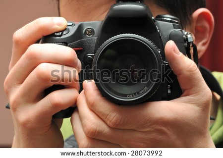 Photographer behind the camera