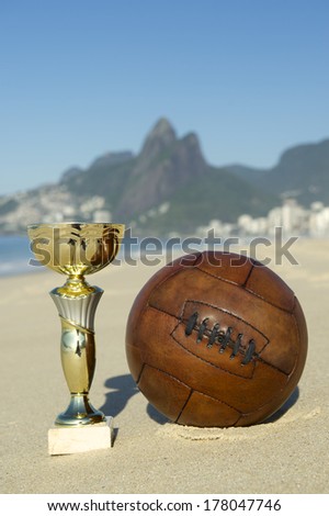 Brazil soccer champion trophy with vintage football Ipanema Beach Rio de Janeiro Brazil
