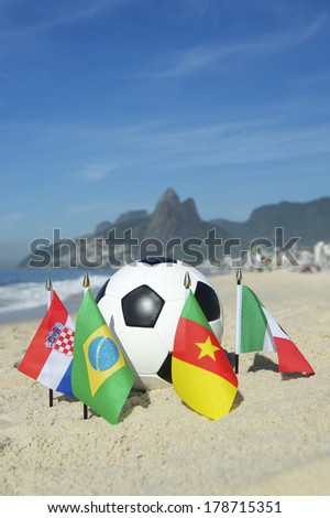International football country Group A team flags with soccer ball on Ipanema beach in Rio de Janeiro Brazil
