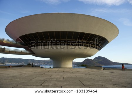 RIO DE JANEIRO, BRAZIL - FEBRUARY 4, 2014: The modernist Niteroi Contemporary Art Museum (MAC) by Oscar Niemeyer stands on a cliff above Guanabara Bay.