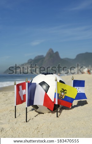 International football country Group E team flags with soccer ball on Ipanema beach in Rio de Janeiro Brazil