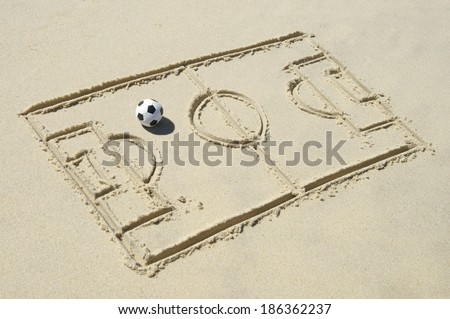 Simple line drawing of football pitch with soccer ball in sand on bright sunlit Brazilian beach