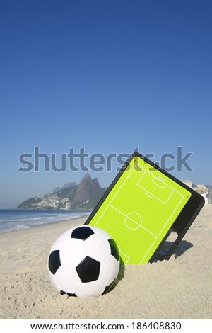 Football tactics board with soccer ball on Ipanema Beach Rio de Janeiro Brazil