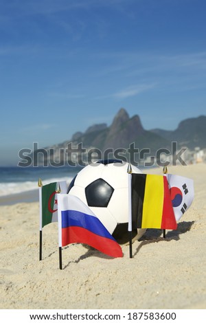 International football country Group H team flags with soccer ball on Ipanema beach in Rio de Janeiro Brazil