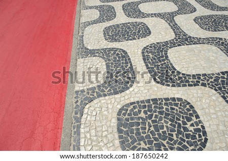 Ipanema Beach Rio de Janeiro boardwalk pattern with stretch of red bike path