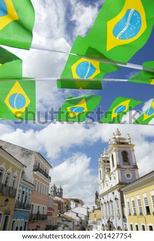 Brazilian flag bunting fluttering over historic city center colonial architecture of Pelourinho Salvador da Bahia Brazil